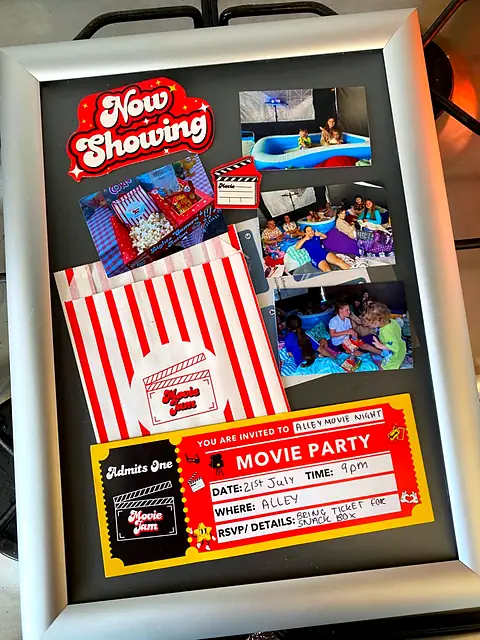 Framed Now Showing display with party photos, popcorn bag and invitation