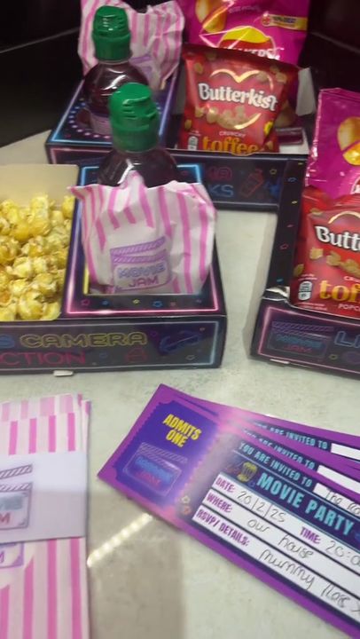 Hands assemble a neon snack tray, then a family hands out trays for movie night
